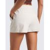imageCRZ YOGA Stretch Shorts for Women Work Casual 25  Athletic Shorts with Pockets for Workout Travel Hiking GolfMilky White Bone