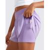 imageCRZ YOGA Girls 2 in 1 Dolphin Athletic Running Shorts with Pockets High Waist Teen Kid Workout Casual Tennis Soccer SplitLilac