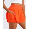 imageCRZ YOGA Girls 2 in 1 Dolphin Athletic Running Shorts with Pockets High Waist Teen Kid Workout Casual Tennis Soccer SplitNeon Orange