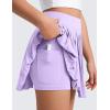 imageCRZ YOGA Girls Pleated Skirt with Shorts Tennis Athletic School Kids Teen Skorts with PocketsLilac