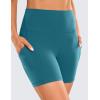 imageCRZ YOGA Womens Butterluxe Biker Shorts with Pockets 5 Inches  High Waisted Volleyball Workout Athletic Yoga Short LeggingsBorealis Green