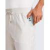imageCRZ YOGA All Day Comfy Golf Pants for Men 31 Quick Dry Lightweight Work Casual Pants with PocketsMilky White