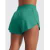 imageCRZ YOGA High Waisted Dolphin Athletic Running Shorts for Women 3quot High Split Comfy Mesh Liner for Gym Workout TrackCascadia Green