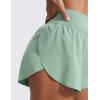 imageCRZ YOGA High Waisted Dolphin Athletic Running Shorts for Women 3quot High Split Comfy Mesh Liner for Gym Workout TrackGreen Palm Court
