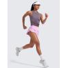 imageCRZ YOGA High Waisted Dolphin Athletic Running Shorts for Women 3quot High Split Comfy Mesh Liner for Gym Workout TrackVita Pink
