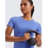 imageCRZ YOGA Seamless Workout Tops for Women Short Sleeve Athletic Tees Breathable Gym Running Yoga ShirtsWild Indigo