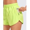 imageCRZ YOGA Womens High Waisted Running Shorts Mesh Liner 3 Dolphin Quick Dry for Athletic Gym Track Workout with Zip PocketNeon Yellow