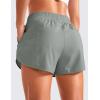 imageCRZ YOGA Womens High Waisted Running Shorts Mesh Liner 3 Dolphin Quick Dry for Athletic Gym Track Workout with Zip PocketSterling