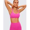 imageCRZ YOGA Womens Strappy Sports Bra  Criss Cross Back Padded Medium Support Wireless Gym Cami Workout YogaHibiscus Purple