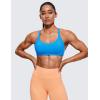 imageCRZ YOGA Womens Strappy Sports Bra  Criss Cross Back Padded Medium Support Wireless Gym Cami Workout YogaMadagascar Blue