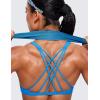 imageCRZ YOGA Womens Strappy Sports Bra  Criss Cross Back Padded Medium Support Wireless Gym Cami Workout YogaMadagascar Blue