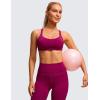 imageCRZ YOGA Womens Strappy Sports Bra  Criss Cross Back Padded Medium Support Wireless Gym Cami Workout YogaMagenta Purple
