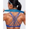 imageCRZ YOGA Womens Strappy Sports Bra  Criss Cross Back Padded Medium Support Wireless Gym Cami Workout YogaWaves Blue