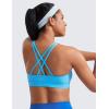 imageCRZ YOGA Womens Strappy Sports Bras Fitness Workout Padded Yoga Top Criss Cross Back CamiKayak Blue