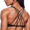 imageCRZ YOGA Womens Strappy Sports Bra  Criss Cross Back Padded Medium Support Wireless Gym Cami Workout YogaBlack