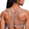 imageCRZ YOGA Womens Strappy Sports Bra  Criss Cross Back Padded Medium Support Wireless Gym Cami Workout YogaLunar Rock