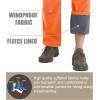 imageMAGCOMSEN Mens Hiking Pants Fleece Lined Winter Snow Water Resistant Pants Soft Shell Outdoor Working Pants with 5 PocketsOrange
