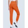 imageMAGCOMSEN Womens Hiking Pants Lightweight Quick Dry Waterproof Joggers with Pockets Athletic Travel Track CasualOrange