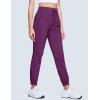 imageMAGCOMSEN Womens Hiking Pants Lightweight Quick Dry Waterproof Joggers with Pockets Athletic Travel Track CasualPurple Red