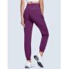 imageMAGCOMSEN Womens Hiking Pants Lightweight Quick Dry Waterproof Joggers with Pockets Athletic Travel Track CasualPurple Red
