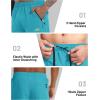 imageMAGCOMSEN Mens Capri Shorts Quick Dry Below Knee 34 Capri Pants with Zipper Pockets for Workout Running Training SummerLake Blue