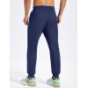 imageMAGCOMSEN Mens Fleece Joggers with Pockets Winter Warm Pants Workout Athletic Gym Sweatpants for MenNavy