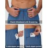 imageMAGCOMSEN Mens Fleece Lined Sweatpants with Zipper Pockets Athletic Workout Running Winter Water Resistant PantsSky Blue