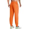 imageMAGCOMSEN Mens Joggers with Zipper Pockets Lightweight Hiking Sweatpants Athletic Pants for Men Running Workout Traning GymOrange