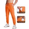 imageMAGCOMSEN Mens Joggers with Zipper Pockets Lightweight Hiking Sweatpants Athletic Pants for Men Running Workout Traning GymOrange