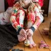 imageBurts Bees Baby and Family Matching Holiday Organic Cotton PajamasAll Wrapped Up